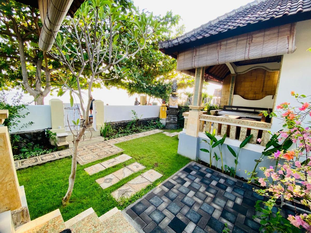 Solaluna Beach Homestay Amed Екстериор снимка