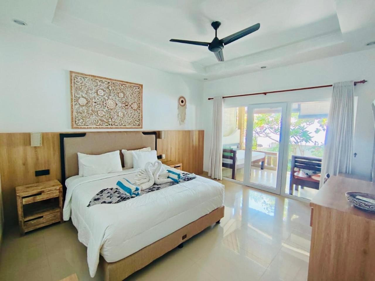 Solaluna Beach Homestay Amed Екстериор снимка